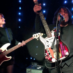 Left Handed Fender Telecaster with stickers on it. Sunburst finish, stolen from Niagara Bar, NYC.,