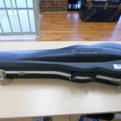 Violin with a black,hard case,